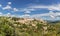 Panoramic view of Gordes forest rock and old village on Luberon massif inÂ French Prealps. Vaucluse, Provence